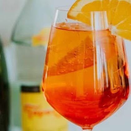 An Aperol Spritz with an orange slice